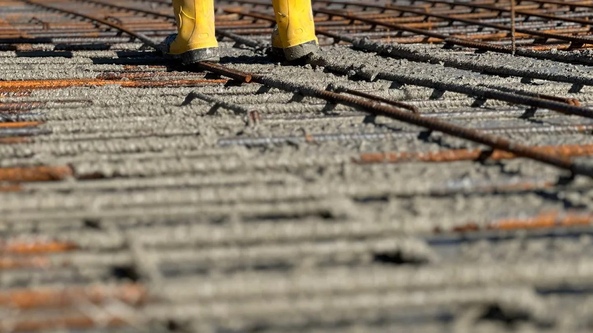 Rebar reinforcement grid set inside wooden forms before a concrete foundation pour