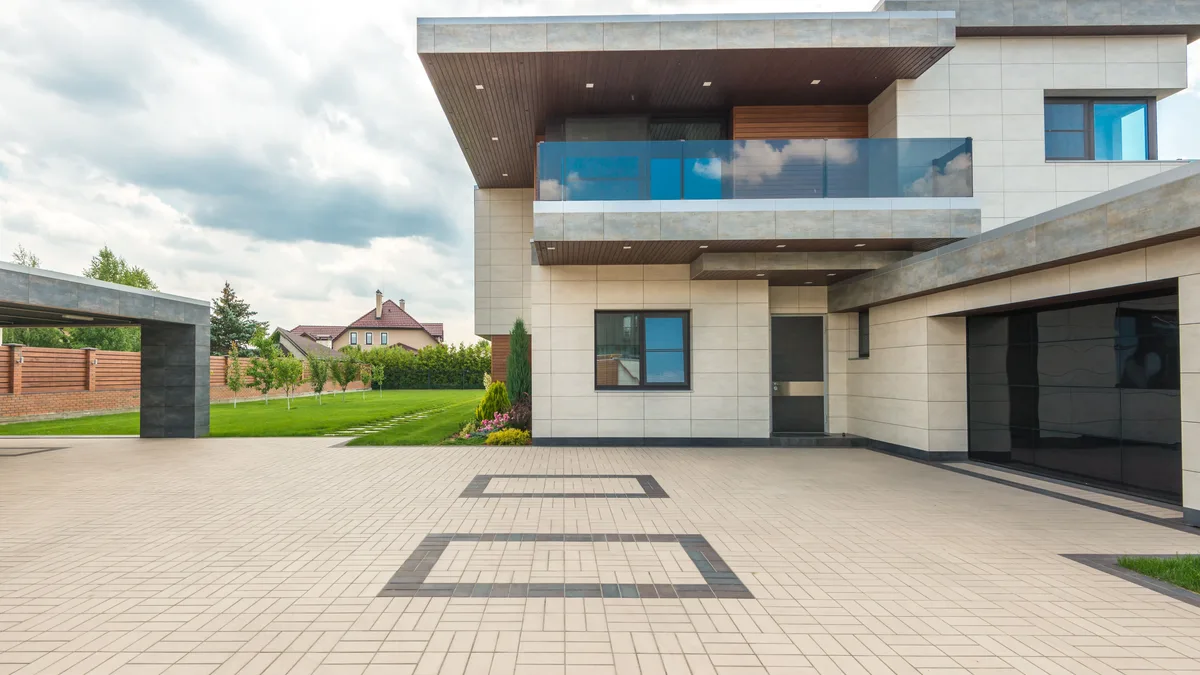 Stamped and colored concrete patio with a decorative stone-pattern texture